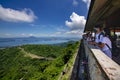 Tagaytay, Cavite, Philippines - Tourists admire the view of Taal volcano and lake from a view deck at People\'s Park in Royalty Free Stock Photo