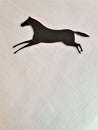 Paper silhouette of running horse on white background Royalty Free Stock Photo