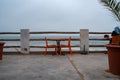 Orange table and chairs with sea view Royalty Free Stock Photo