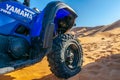 Yamaha quad parked in the Sahara desert. Royalty Free Stock Photo