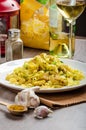 Tagliatelle with chicken curry, leek and garlic