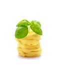 Tagliatelle italian pasta with basil isolated on white background Royalty Free Stock Photo