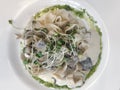 Tagliatelle Italian pasta with forest mushroom, vegetables and pesto sauce.  Flat lay.  Top view Royalty Free Stock Photo