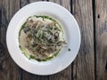 Tagliatelle Italian pasta with forest mushroom, vegetables and pesto sauce Royalty Free Stock Photo