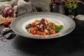 Tagliatelle with octopus and cherry tomatoes