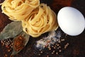 Tagliatelle pasta,egg and spices Royalty Free Stock Photo