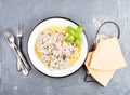 Tagliatelle pasta with mushrooms and creamy sauce, parmesan cheese over concrete textured background Royalty Free Stock Photo