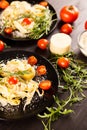 Tagliatelle pasta with parmesane, lettuce and cherry tomatoes Royalty Free Stock Photo