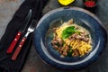 Tagliatelle pasta with porcini mushrooms in cream sauce and Parmesan cheese served Royalty Free Stock Photo