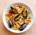 Tagliatelle pasta with shrimps and mussels. Seafood. Italian cuisine