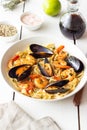 Tagliatelle pasta with shrimps and mussels. Seafood. Italian cuisine