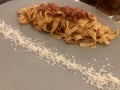 Tagliatelle bolognese with parmesan. Pasta dinner Royalty Free Stock Photo