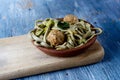 Tagliatelle with vegan meatballs and kale