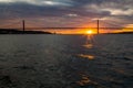 Tagus River, Bridge April 25 Lisbon at sunset from ship, Portugal. Royalty Free Stock Photo