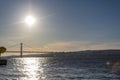 Tagus River and Lisbon 25 of April bridge at sunset Royalty Free Stock Photo