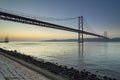 Tagus river and 25th April bridge at dawn Royalty Free Stock Photo
