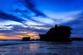 Tahah Lot Temple and ocean waves at sunset, Bali Royalty Free Stock Photo