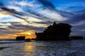 Tahah Lot Temple and ocean waves at sunset, Bali Royalty Free Stock Photo