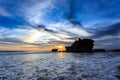 Tahah Lot Temple and ocean waves at sunset, Bali Royalty Free Stock Photo