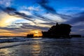 Tahah Lot Temple and ocean waves at sunset, Bali Royalty Free Stock Photo