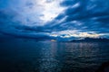 Tahiti sunset with several boats sailing in the distance, creating a peaceful atmosphere Royalty Free Stock Photo