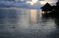 Tahitian sunset with bungalow Royalty Free Stock Photo