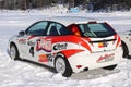 TAHKO, FINLAND - FEBRUARY 23, 2010: Stylish racing car Ford on studded tires for winter rally in Tahko, Finland
