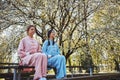 Tai chi master meditating with her student outdoors Royalty Free Stock Photo