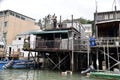 Houses on Stilts on the seafront. Tai O Fishing Village, Hong Kong. November 10, 2018.