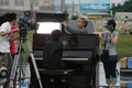 Jam Hsiao filmming with a piano in Gaomei Wetlands Royalty Free Stock Photo