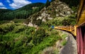 The Taieri Gorge railway train taking a bend in the gorge near Dunedin, New Zealand Royalty Free Stock Photo