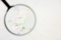 Taif city visualization illustrative concept on display screen through magnifying glass Royalty Free Stock Photo