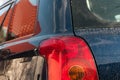 Tail light on modern dirty japanese car