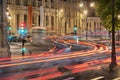 Cars driving along Quai de Conti at night