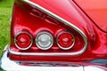 Tail Lights and a wing on old red american car Royalty Free Stock Photo