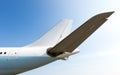 Tail of a passenger plane close-up. Side view. Royalty Free Stock Photo