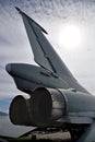 The tail of the plane against the sky and sunlight Royalty Free Stock Photo