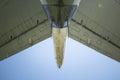 The tail of the plane. Hull, chassis, engines and propellers of an old plane. large, cargo, military aircraft with a large payload Royalty Free Stock Photo