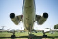 The tail of the plane. Hull, chassis, engines and propellers of an old plane. large, cargo, military aircraft with a large payload