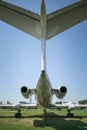 The tail of the plane. Hull, chassis, engines and propellers of an old plane. large, cargo, military aircraft with a large payload