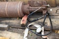 A tail of rusty ammunition and a stethoscope lie in a wooden box with ammunition, military medicine Royalty Free Stock Photo