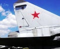 Tail unit of the Soviet fighter MIG-25 with the emblem