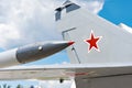 Tail and wing of soviet military jet fighter