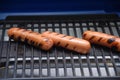 Tailgate grilling hot dog or franks time.