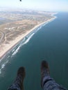 Tailgate surfing overcoast in California helicopter Royalty Free Stock Photo