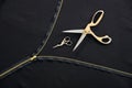 Tailor background with open golden zipper and two scissors in atelier studio Royalty Free Stock Photo
