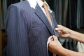 Tailor Fitting Man in Suit Royalty Free Stock Photo