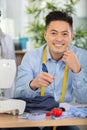 tailor man working in tailor shop Royalty Free Stock Photo