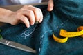 Tailor man working in his tailor shop Royalty Free Stock Photo