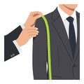 Tailor Measuring Customer Shoulder for Custom Suit Fitting in Professional Setting Royalty Free Stock Photo
